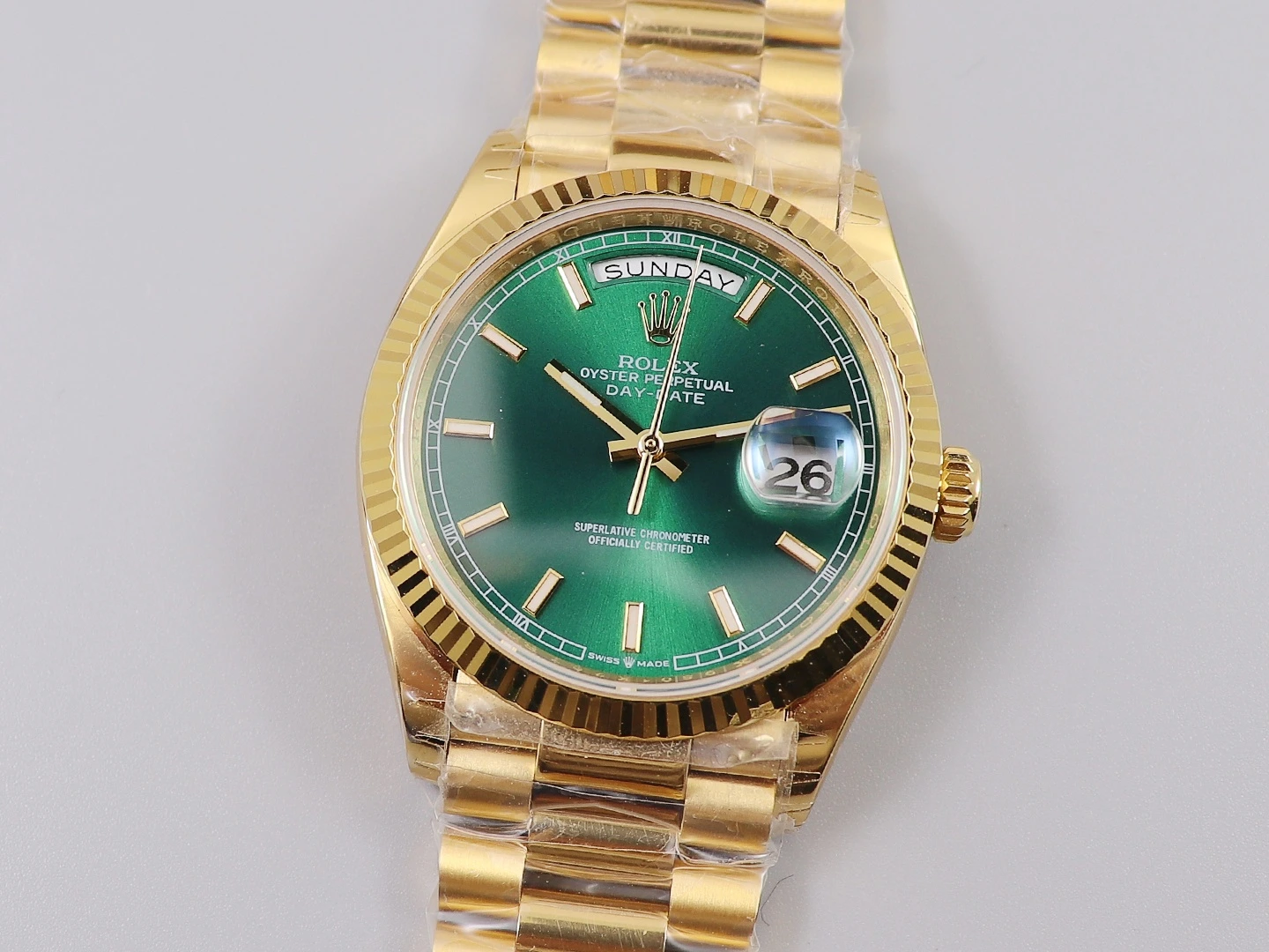 podróbka rolex daydate złoty z zieloną tarczą