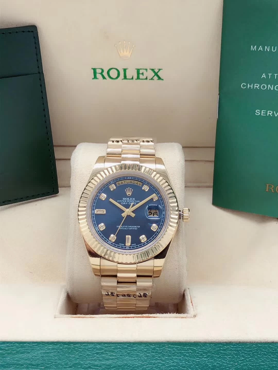 podróbka rolex daydate złoty z niebieską tarczą